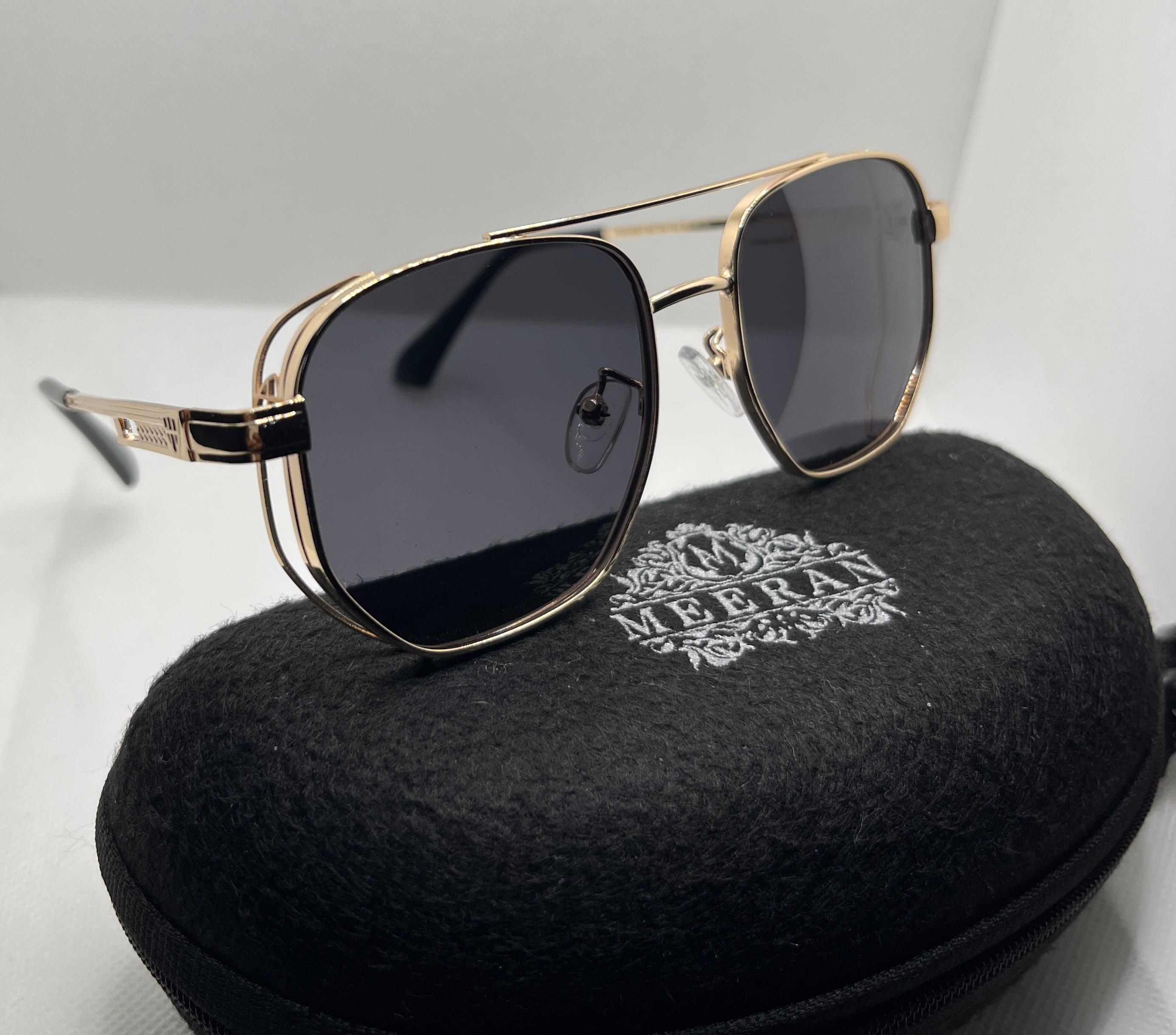 Meeran polo sunglasses with blue lenses and a black/gold frame, featuring UV protection